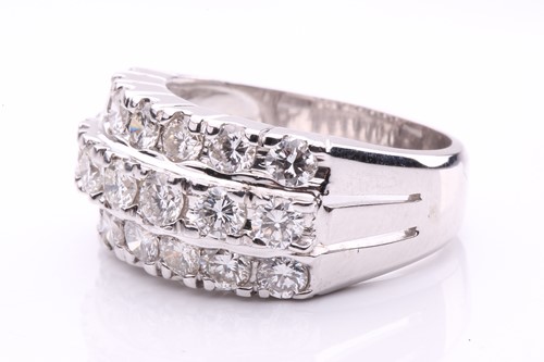 Lot 24 - A diamond dress ring, set with three rows of...