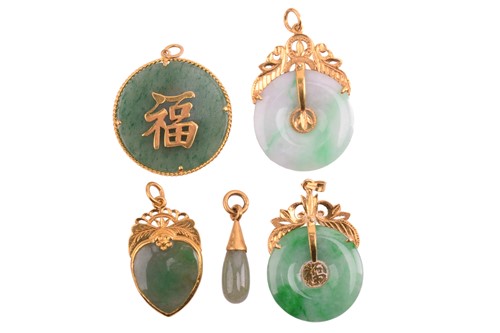 Lot 348 - A collection of Chinese hardstone pendants, to...