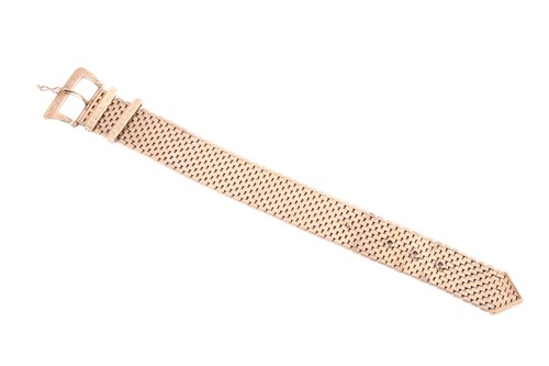 Lot 120 - A 9ct gold jarretière slide bracelet with...