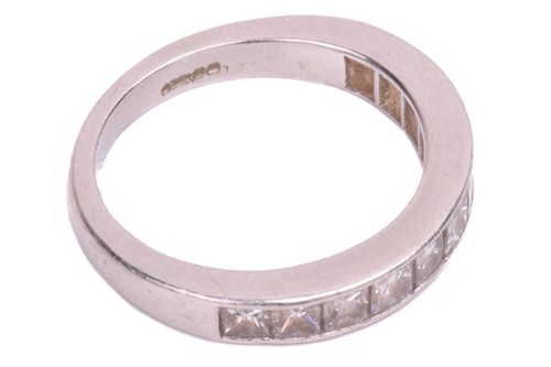 Lot 74 - A diamond half-eternity ring in platinum,...