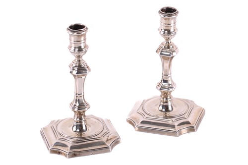 Lot 541 - A pair of silver George I style tapersticks by...