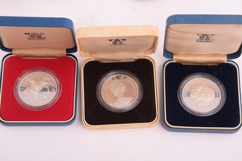 Lot 522 - A collection of silver comprising a pair of...