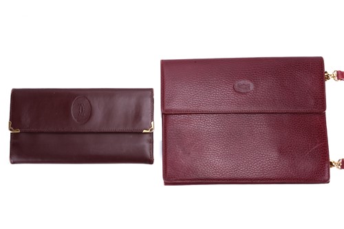 Lot 304 - Must de Cartier - a long wallet and a shoulder...