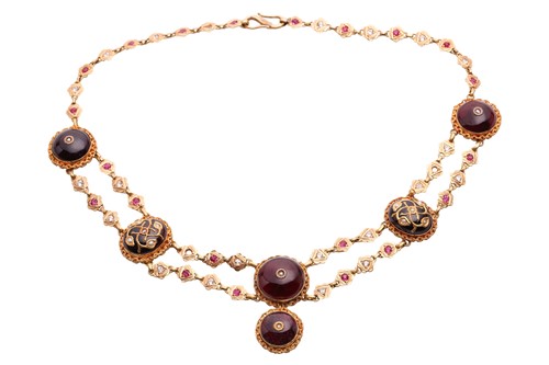 Lot 197 - An Indian garnet necklace, featuring a central...