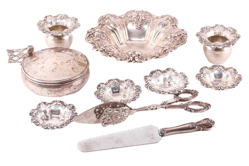 Lot 542 - A collection of white metal items stamped...