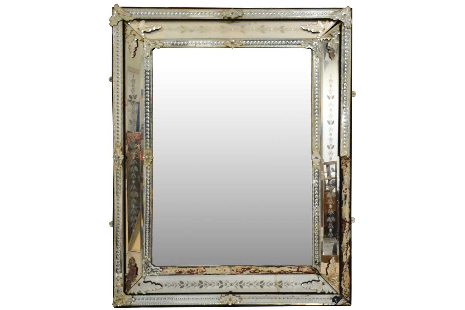 Lot 205 - A large Venetian rectangular wall mirror, with...