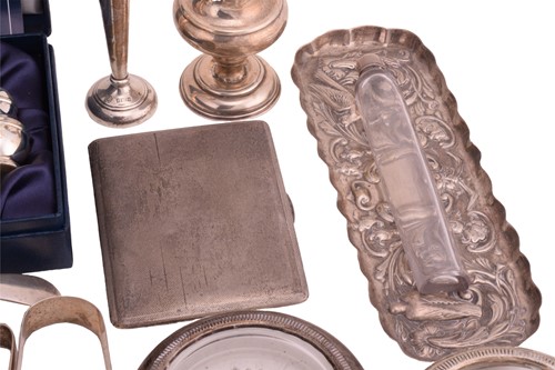 Lot 562 - A collection of assorted silver items...