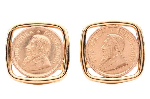 Lot 279 - A pair of cufflinks inset with 1/10oz...