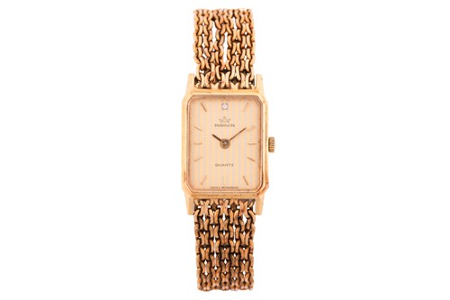 Lot 459 - A Marvin 9k gold lady's Quartz wristwatch...