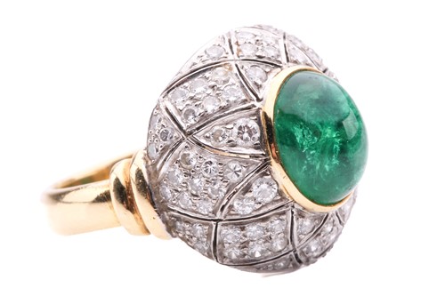 Lot 180 - An emerald and diamond bombé ring, featuring...