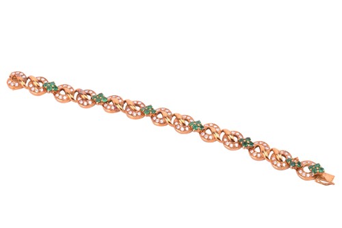 Lot 116 - An emerald and diamond circular link bracelet...