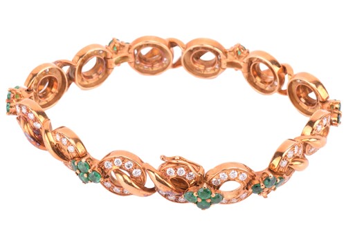 Lot 116 - An emerald and diamond circular link bracelet...