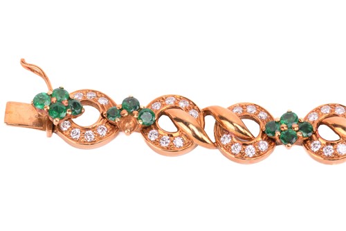 Lot 116 - An emerald and diamond circular link bracelet...