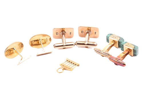 Lot 16 - Three pairs of cufflinks and a charm;...