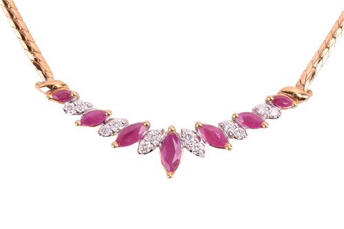 Lot 201 - A ruby and diamond necklace in 18ct gold,...