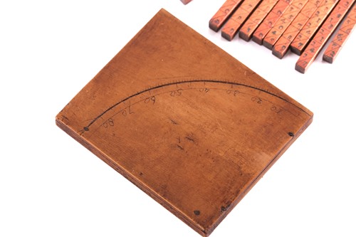 Lot 230 - A set of Napier's Bones, the fruitwood case...