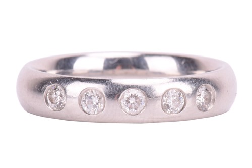 Lot 282 - A platinum and diamond wedding band, court...