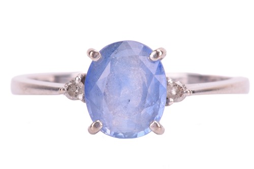 Lot 314 - A sapphire ring, set with a central oval...