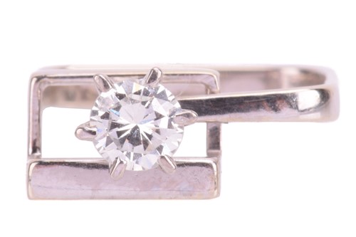 Lot 230 - A diamond abstract solitaire ring, featuring a...