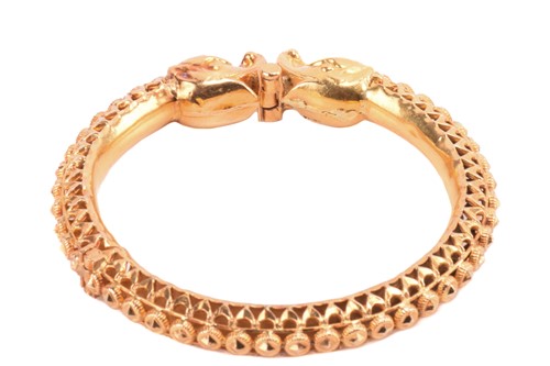 Lot 284 - An Indian zoomorphic hinged bracelet of...