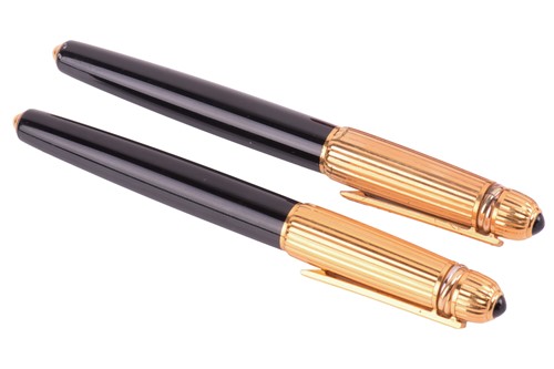 Lot 405 - Pasha de Cartier - a ballpoint pen and a...