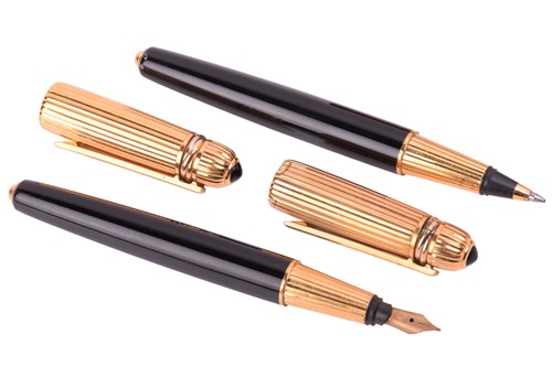 Lot 405 - Pasha de Cartier - a ballpoint pen and a...