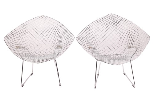 Lot 161 - A pair of diamond-style chairs, after Harry...