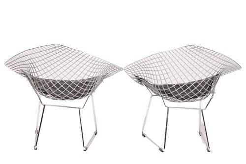 Lot 161 - A pair of diamond-style chairs, after Harry...