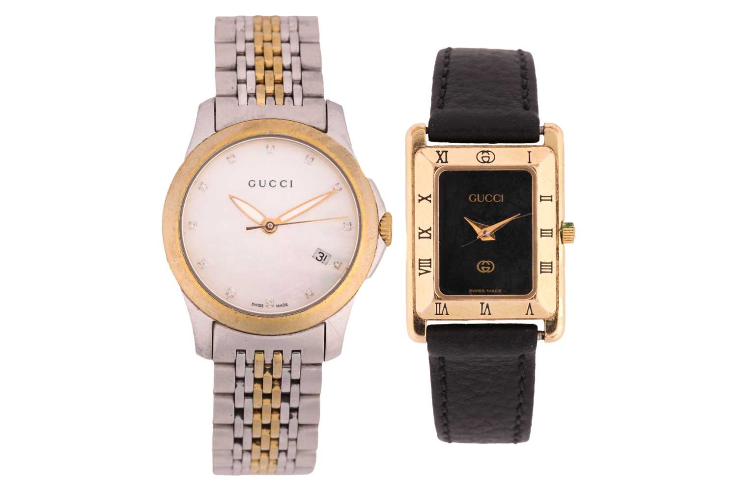 Lot 418 - A collection of two Gucci wristwatches...