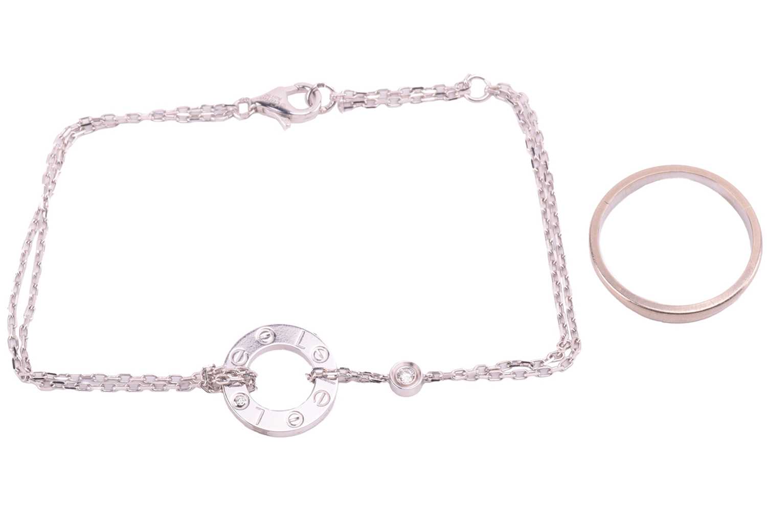 Lot 205 - Cartier - a 'Love' double chain bracelet and a...