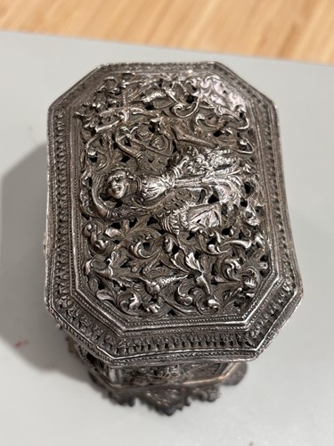 Lot 357 - A Burmese silver canted rectangular betel box...