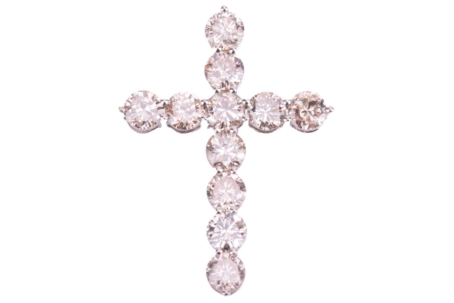 Lot 66 - A diamond cross pendant, set with round...