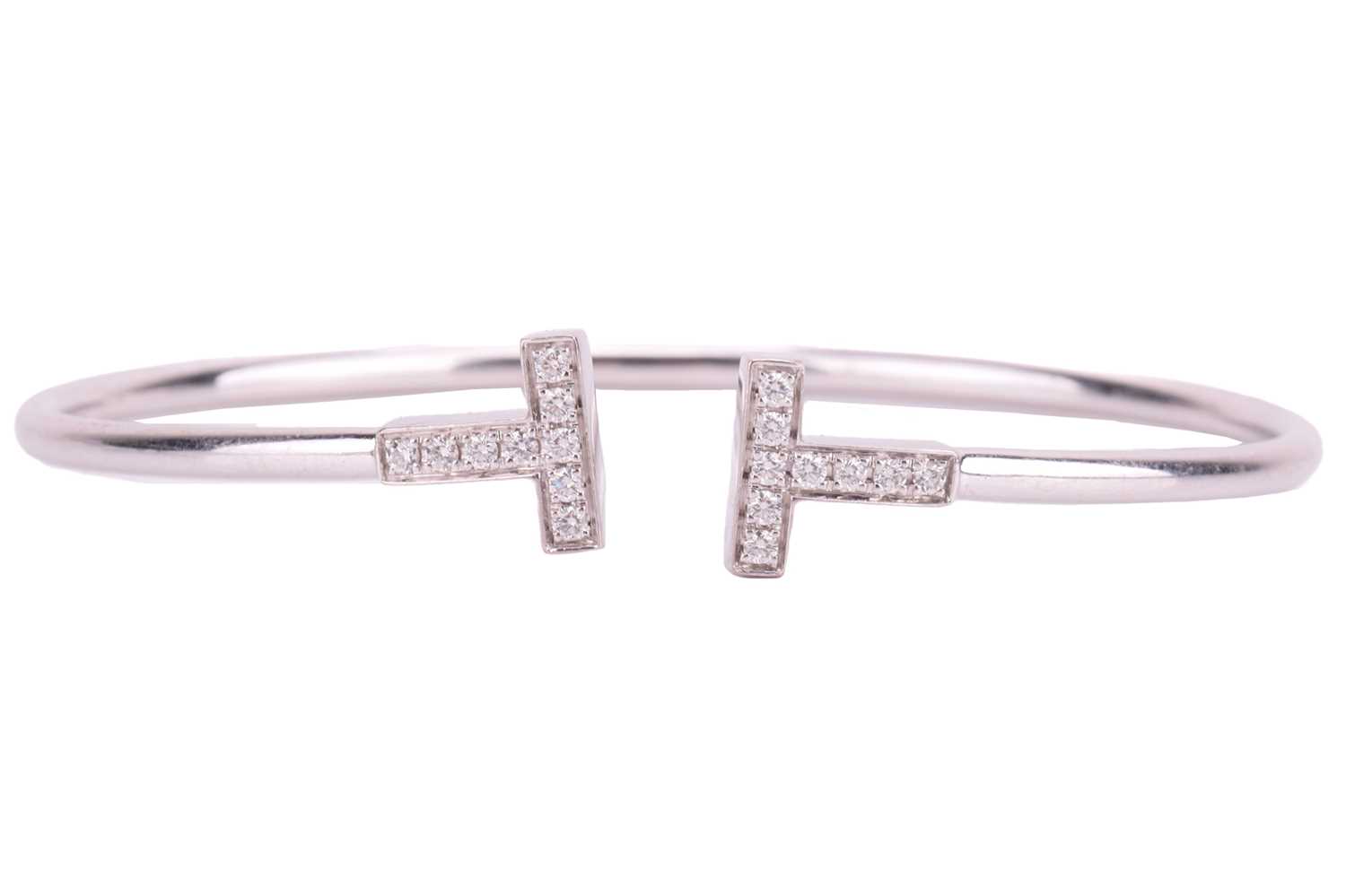 Lot 90 - Tiffany & Co. - a Tiffany T wire bracelet in...