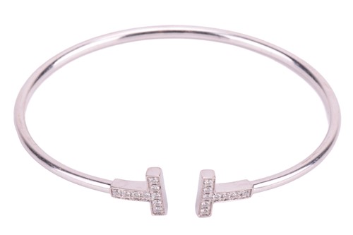Lot 90 - Tiffany & Co. - a Tiffany T wire bracelet in...