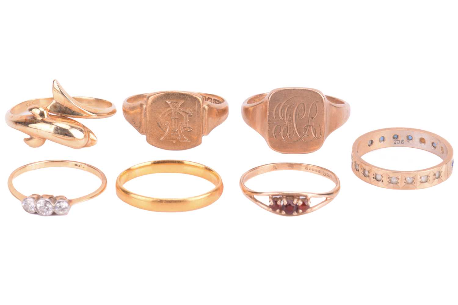 Lot 117 - A collection of seven gold rings, including
