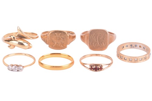 Lot 117 - A collection of seven gold rings, including a...