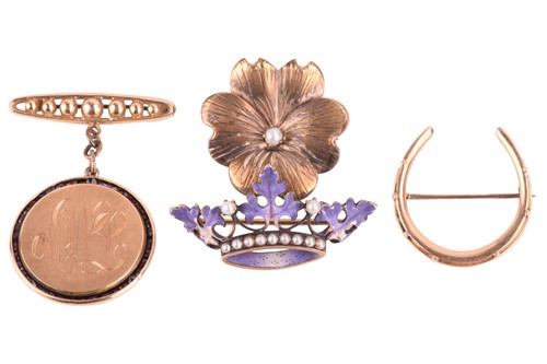 Lot 7 - A group of four brooches; to include an enamel...