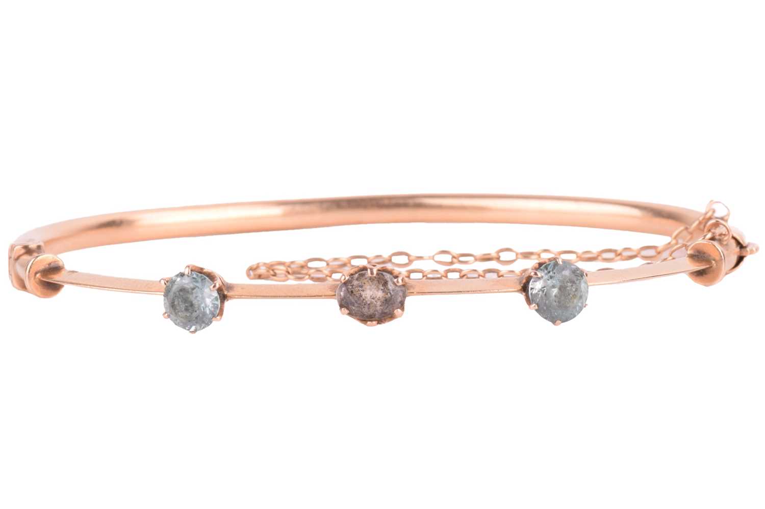 Lot 4 - An Early 20th-century gem-set hinged bracelet,...
