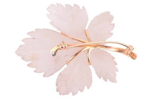 Lot 2 - A carved quartz maple leaf brooch, the...