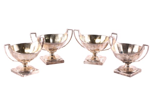 Lot 514 - A set of four George III silver salts, with...