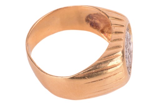 Lot 19 - A diamond-set signet style ring, the oval ring...