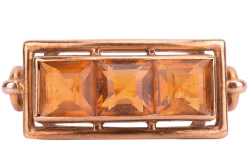 Lot 115 - A citrine dress ring, set with a row of three...
