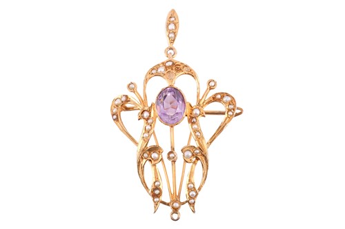 Lot 329 - An amethyst and seed pearl pendant brooch, the...