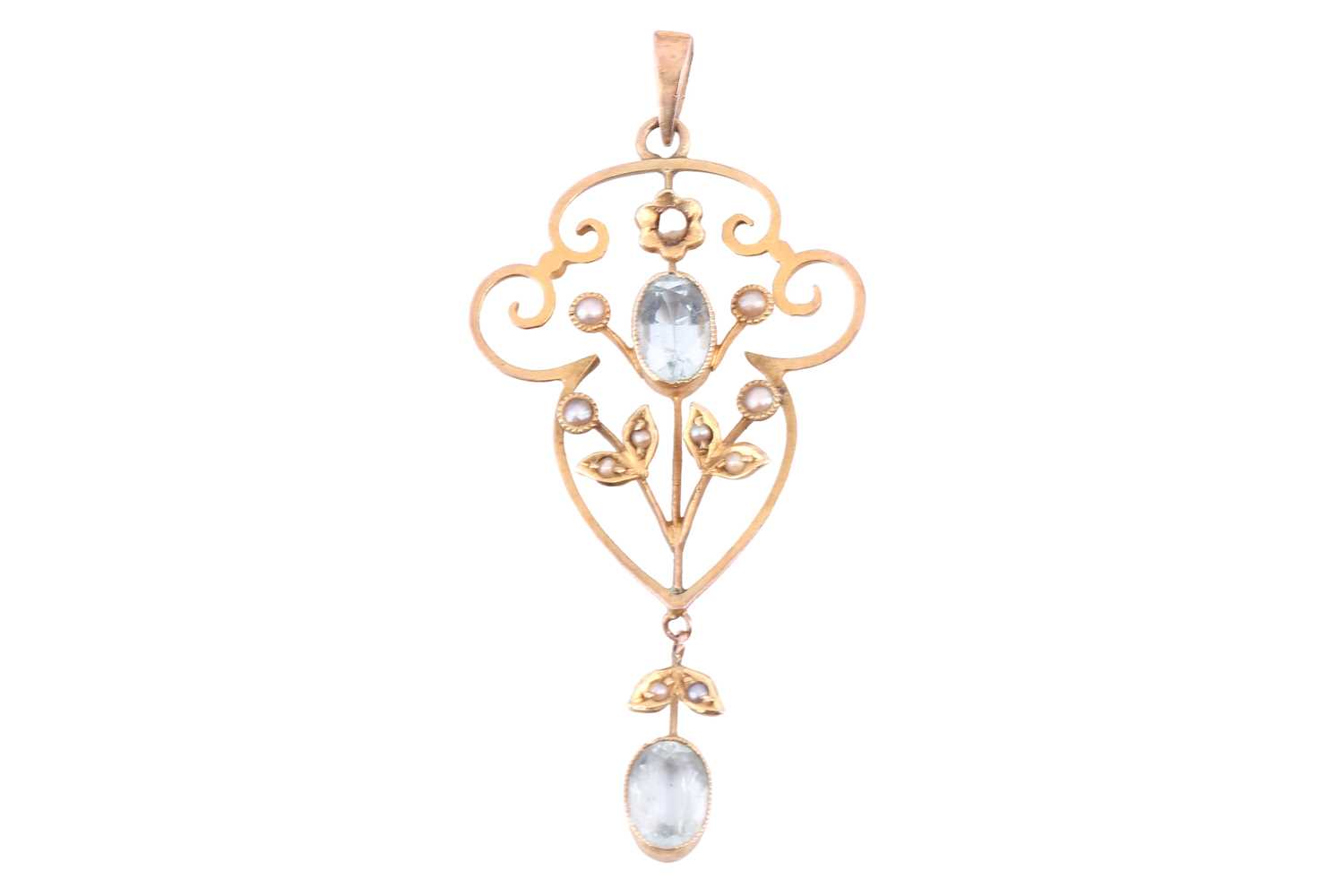 Lot 79 - An aquamarine and seed pearl pendant, the...