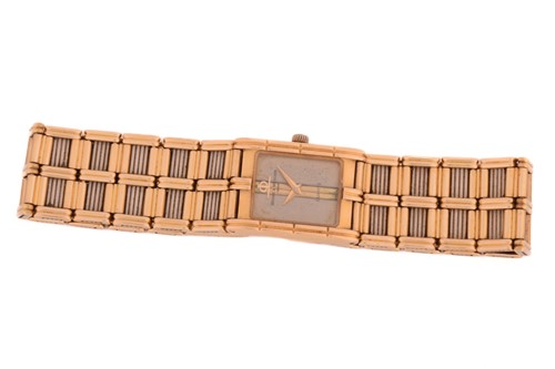 Lot 423 - A lady's Baume & Mercier bracelet watch in...