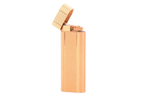 Lot 400 - A Niki Lauda gifted Cartier lighter, featuring...