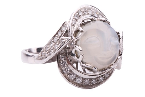Lot 86 - A carved moonstone and diamond dress ring,...