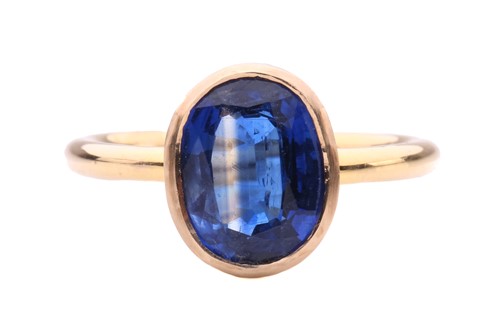 Lot 247 - A kyanite dress ring, features an oval-cut...