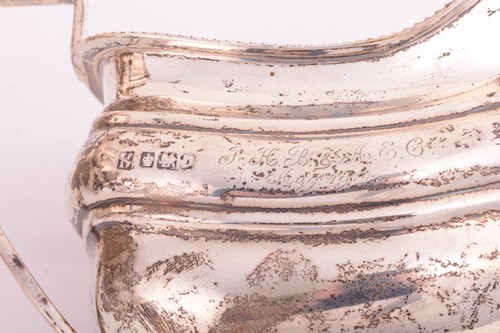 Lot 422 - A three piece silver tea set, rounded...