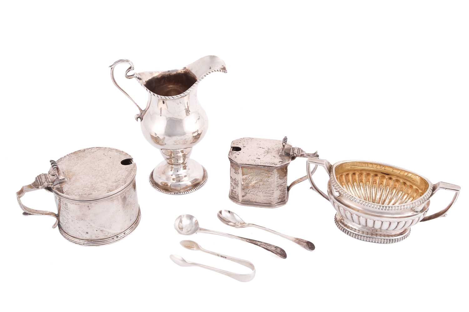 Lot 411 - A George II silver cream jug, inverted...